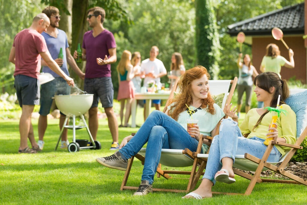 women-chatting-on-a-garden-party-PTBU9A8-1024x683